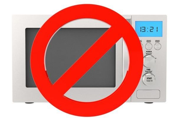 microwave with a red no sign on it