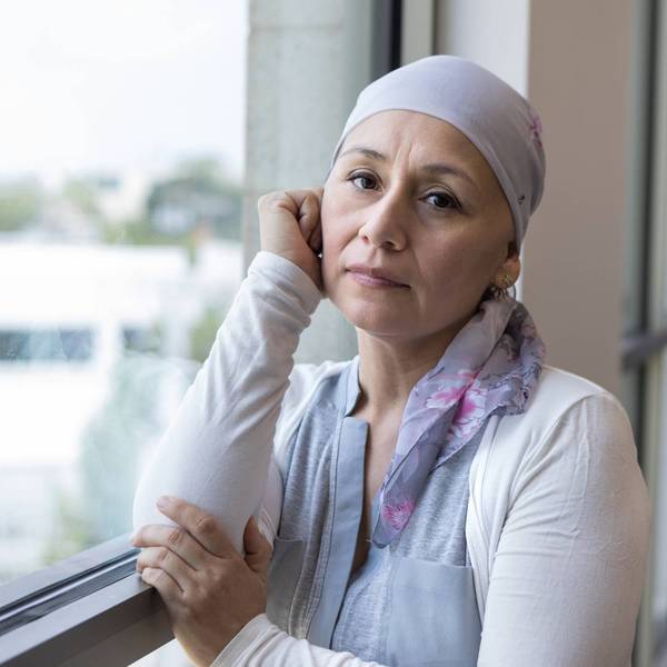 Mid adult woman fighting cancer