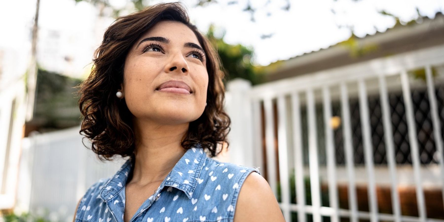 Mid adult woman with schizophrenia contemplating