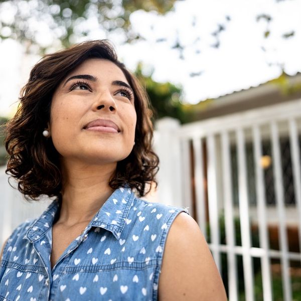 Mid adult woman with schizophrenia contemplating
