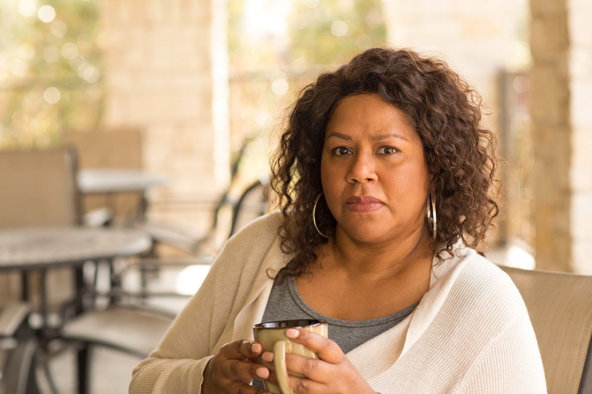 Middle age woman in deep thought