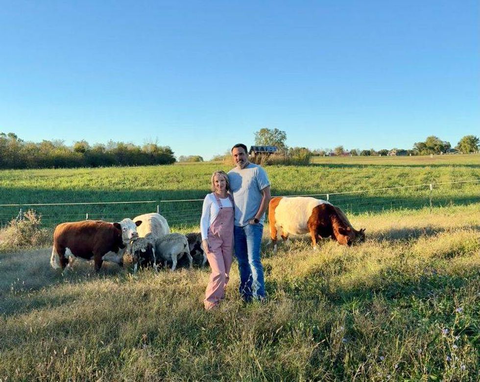 Mindy, her husband and their four-legged family members.