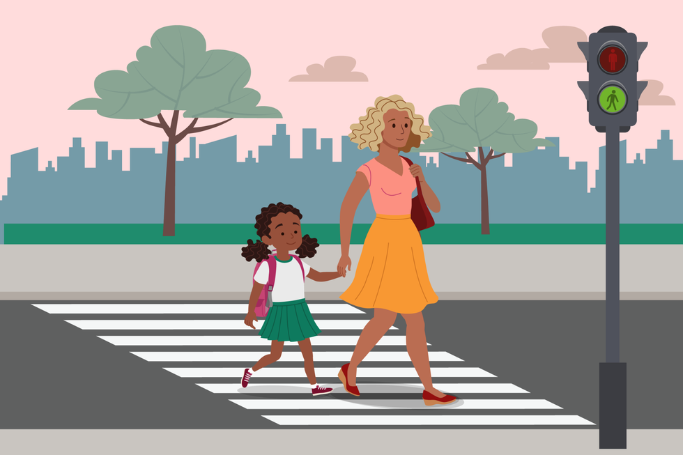 mom and child crossing the street