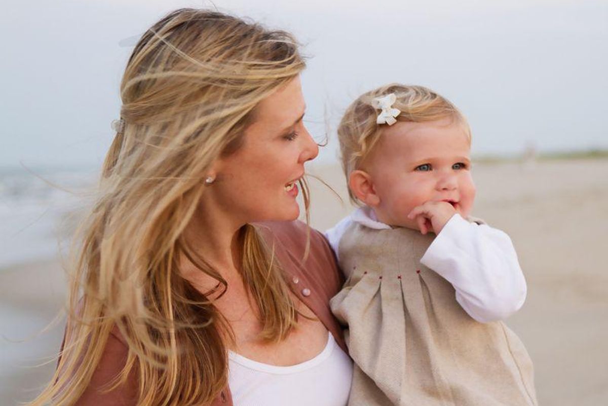 mom and child on the beach
