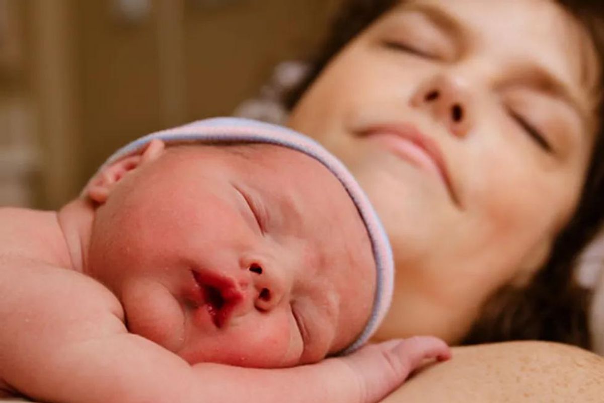 mother holding a newborn