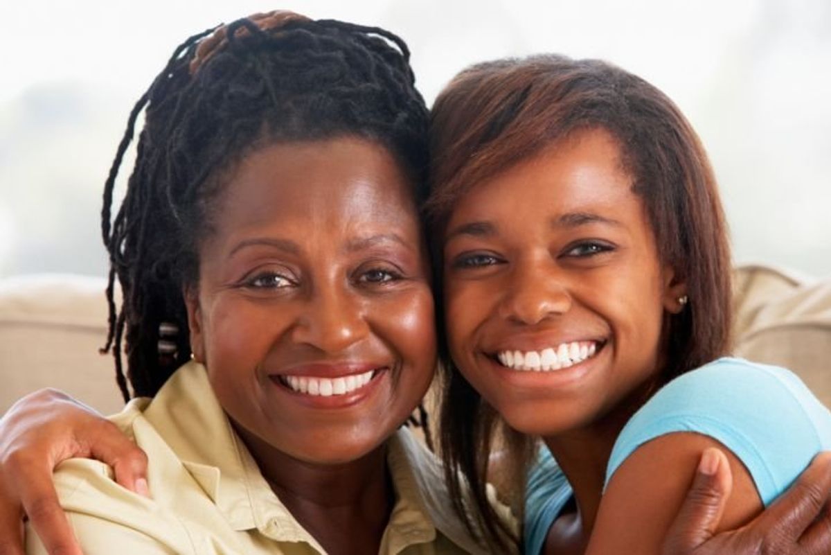 mother hugging her child