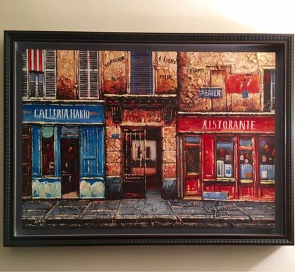 My son D bought an oil painting in Piazza Navona and had it framed at home.