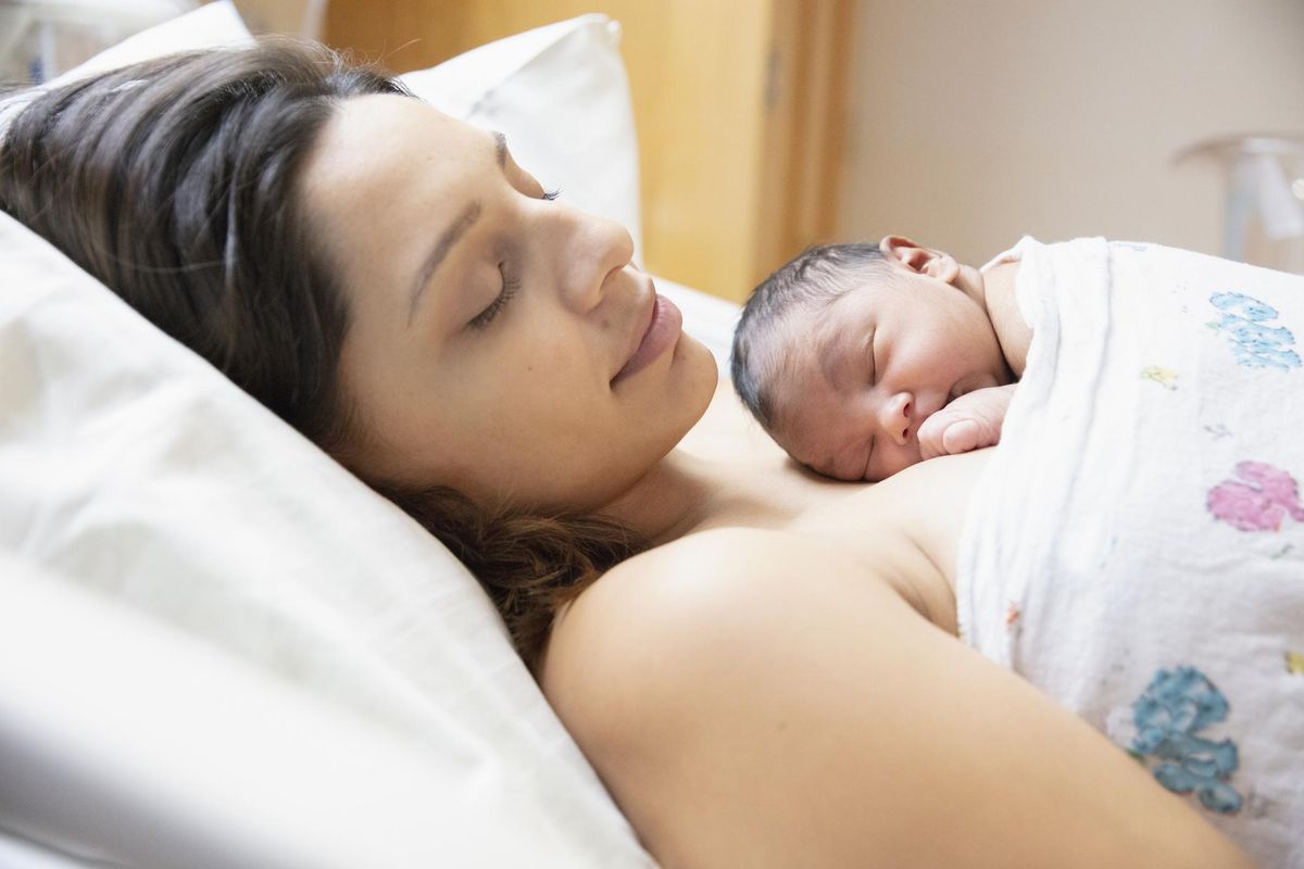 New born baby at hospital with mother