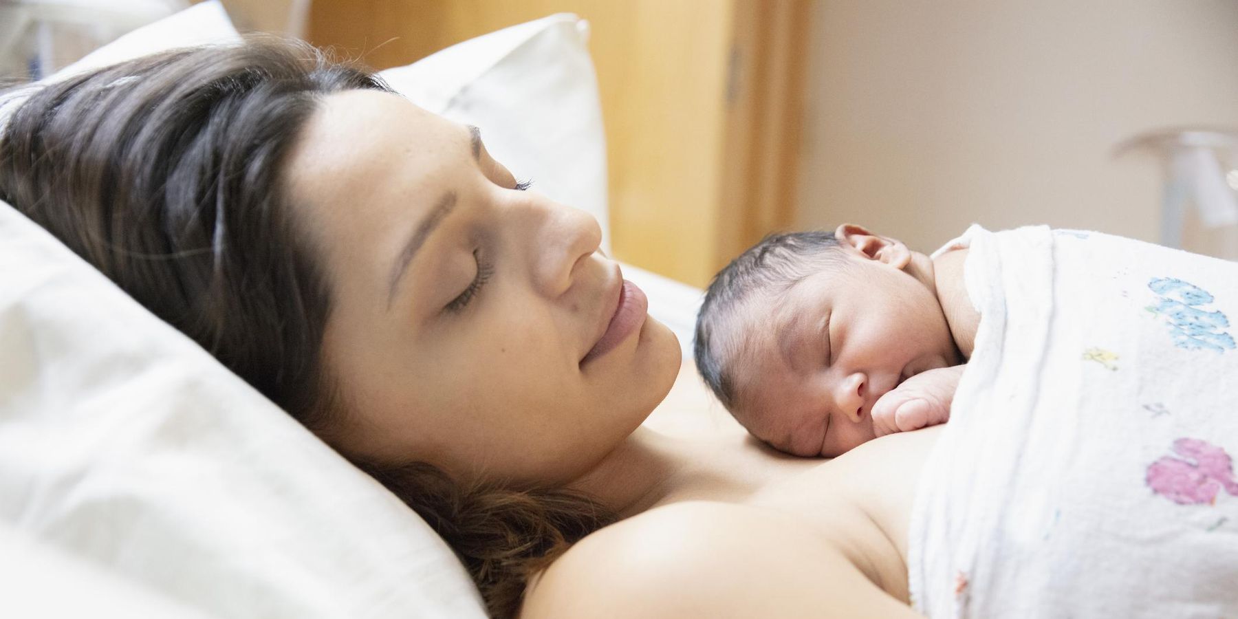 New born baby at hospital with mother