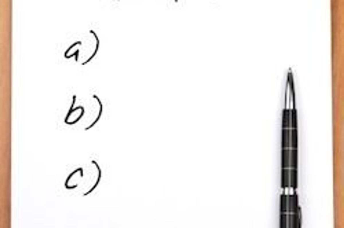 new years resolutions written on a notepad