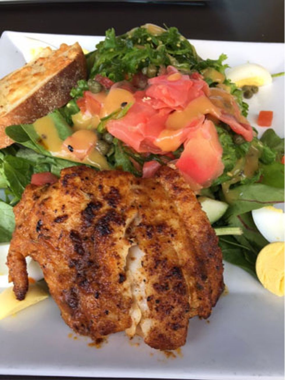 Nicoise salad with blackened grouper, pickled ginger and seaweed salad