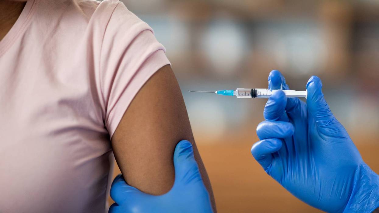 Nurse giving Biologics injection to woman patient for Treating Asthma