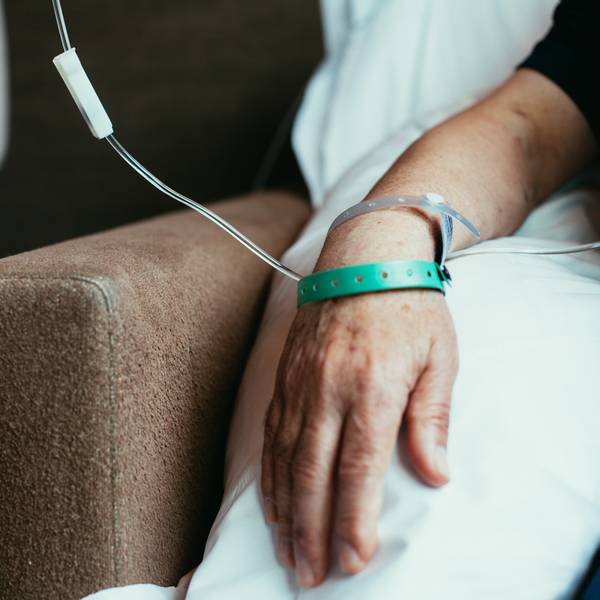 Old man patient hand in hospital