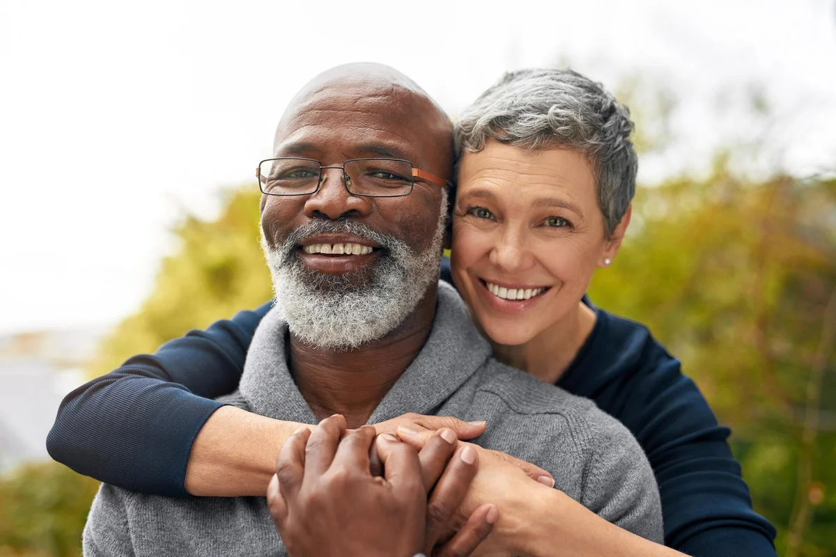 older couple hugging