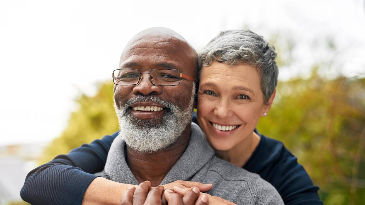older couple hugging
