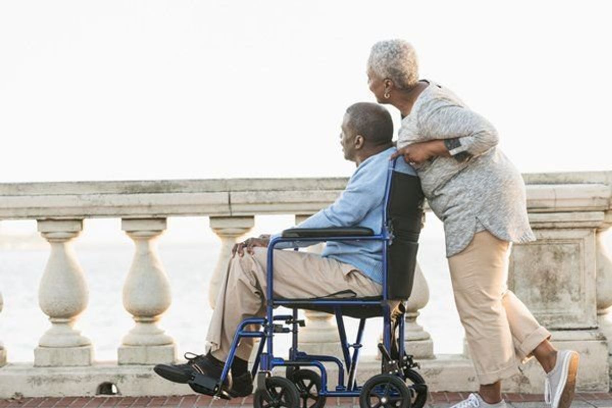 older couple on a bridge