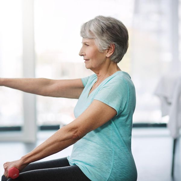 older woman lifting weights