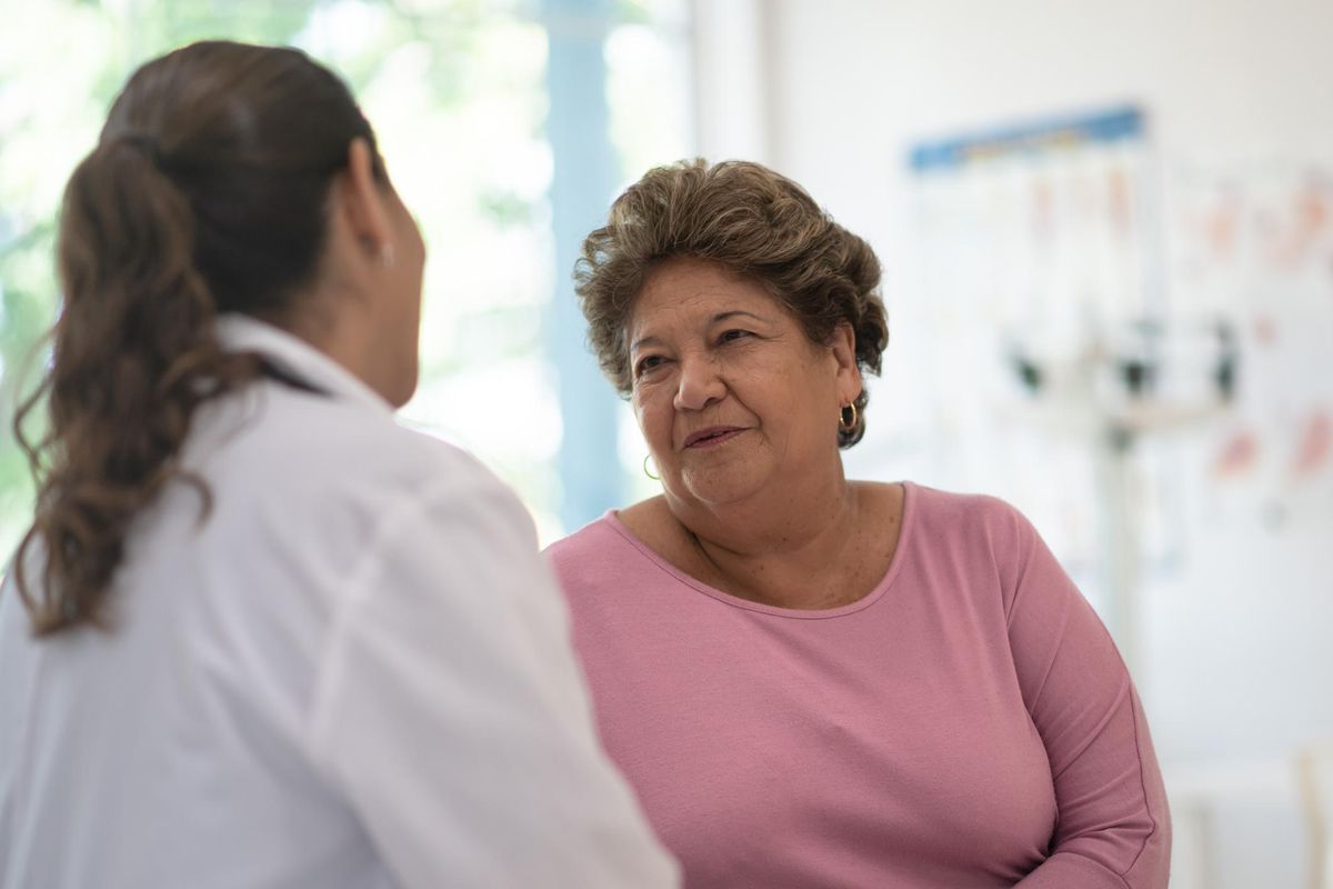 Older Woman talking with the Doctor