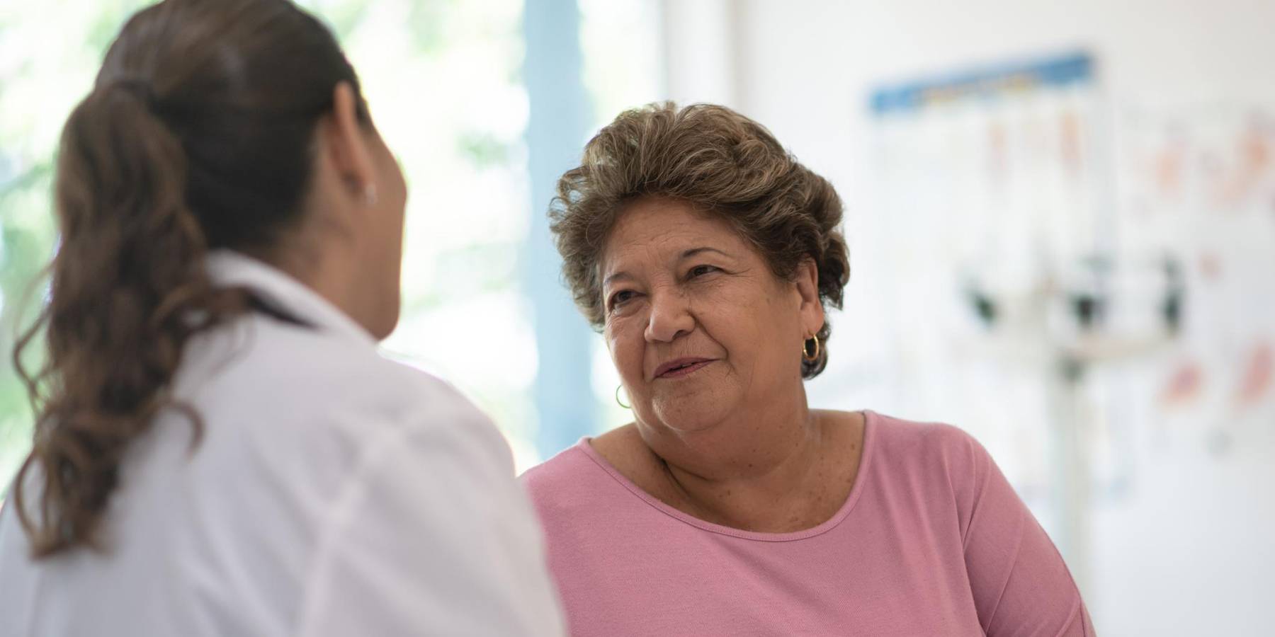 Older Woman talking with the Doctor