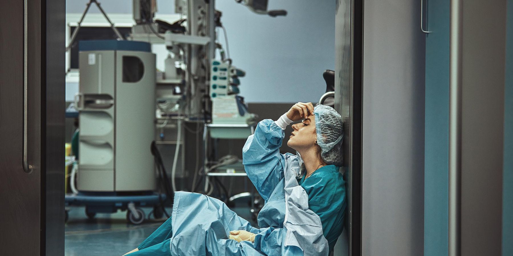 oman surgeon looking fatigued after surgery