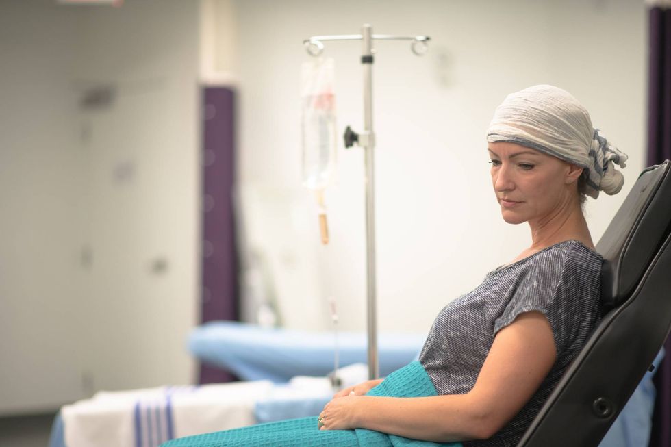 oncology patient rests while receiving intravenous chemotherapy
