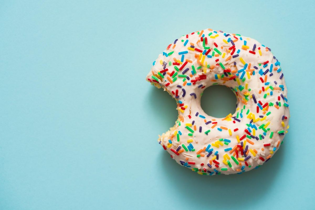 One bite missing of donut