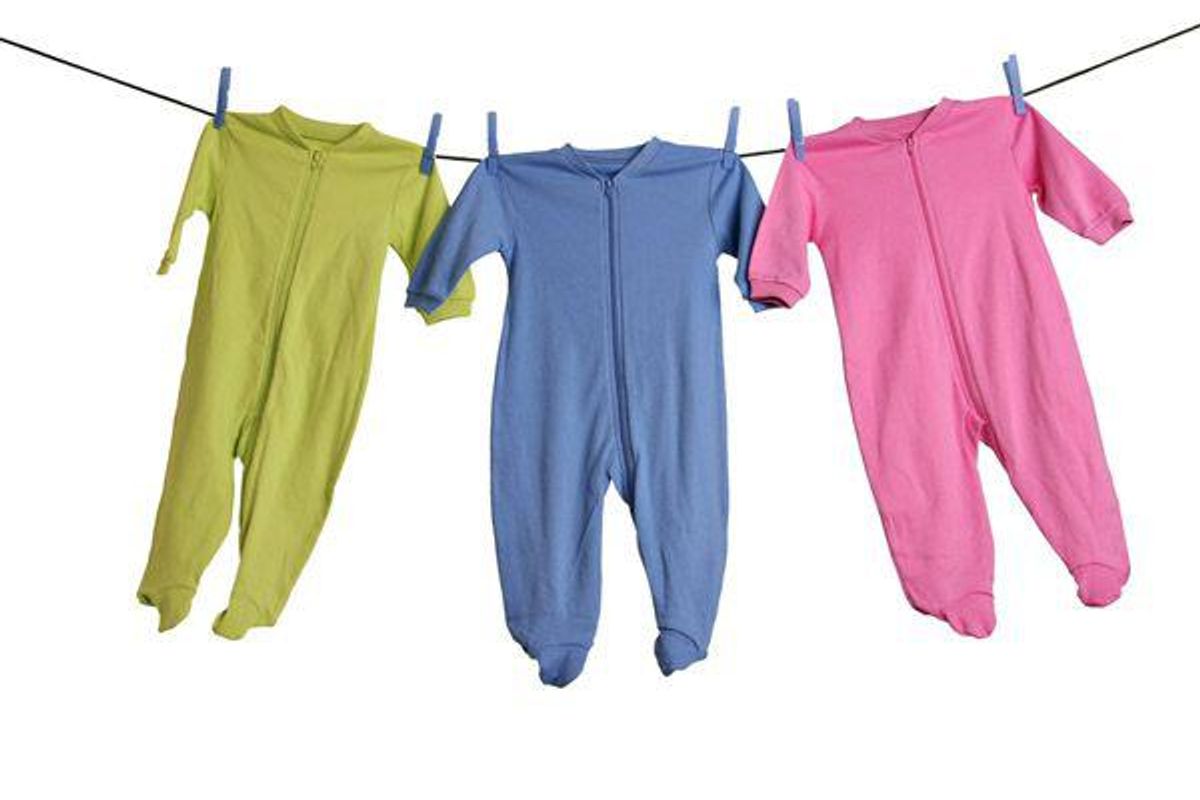 onesies hanging on a line