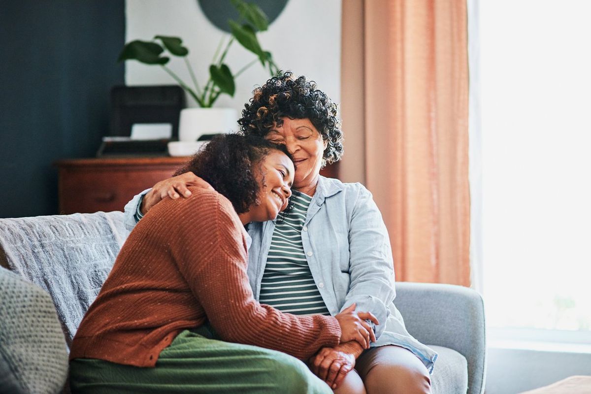 parent and adult child hugging