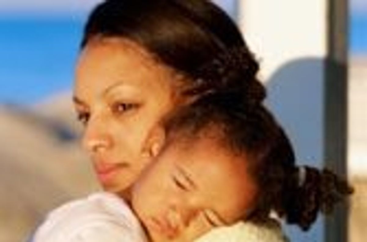 parent holding child