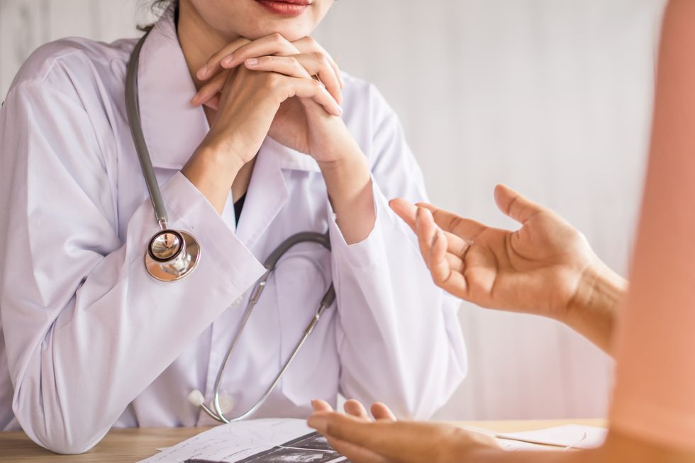 patient speaking with their doctor