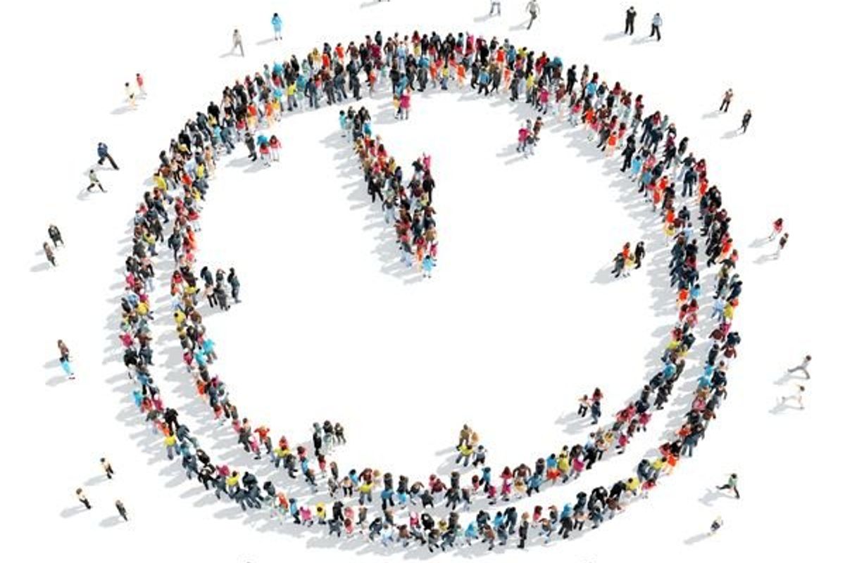 people lined up to make the shape of a clock