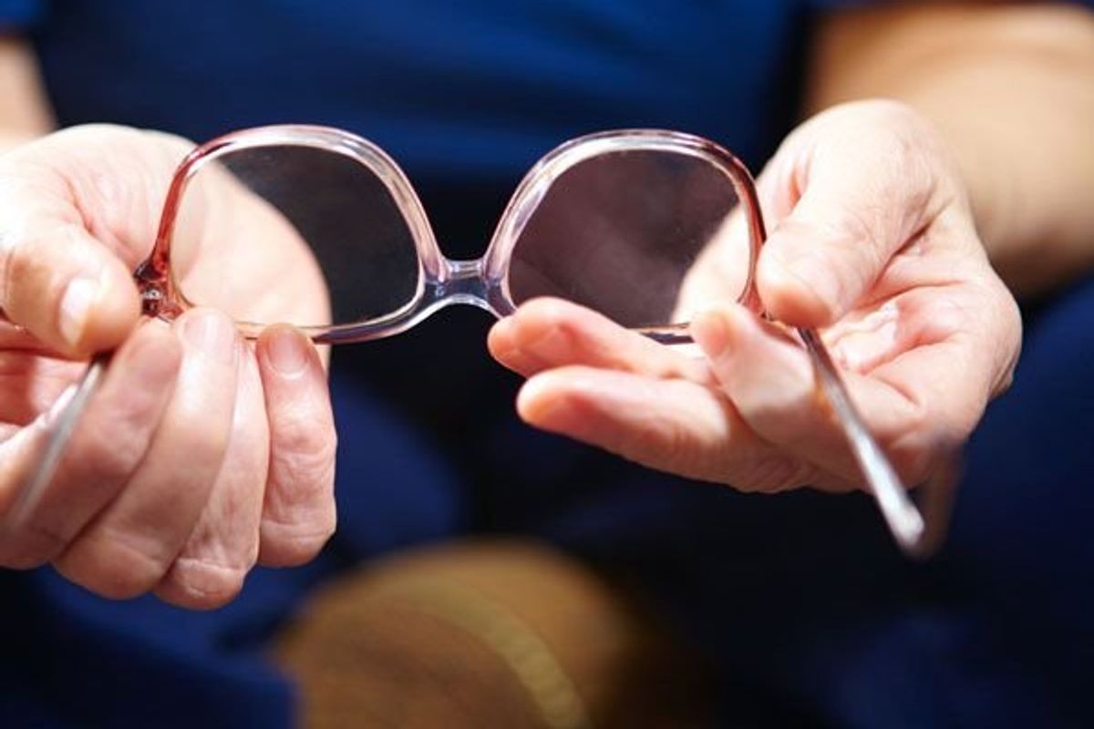 person holding glasses