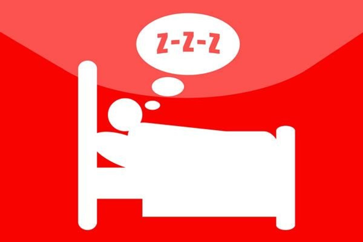 person sleeping in a bed