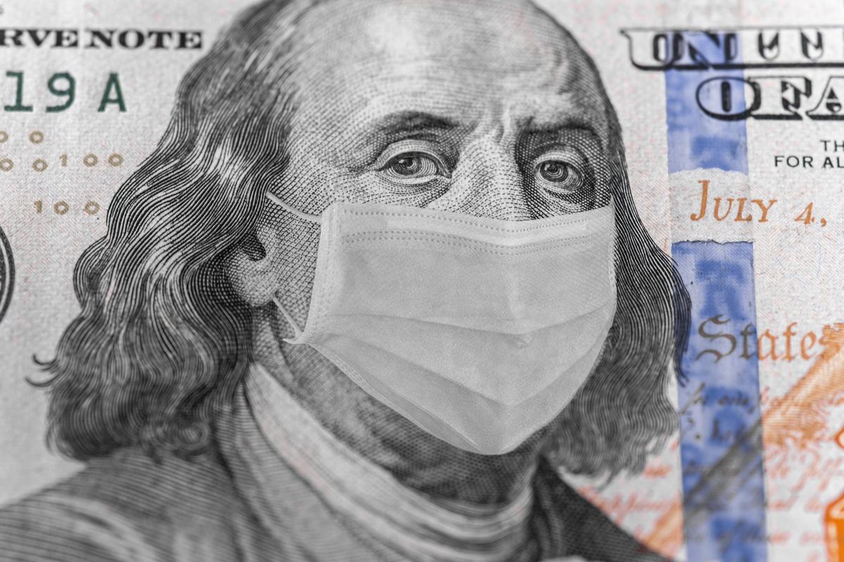 Photo illustration of Ben Franklin in a mask on a dollar 100 bill