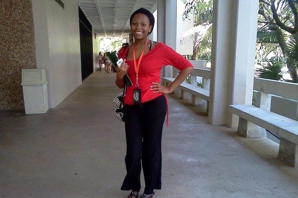 photo of crystal jackson standing in an outdoor hallway