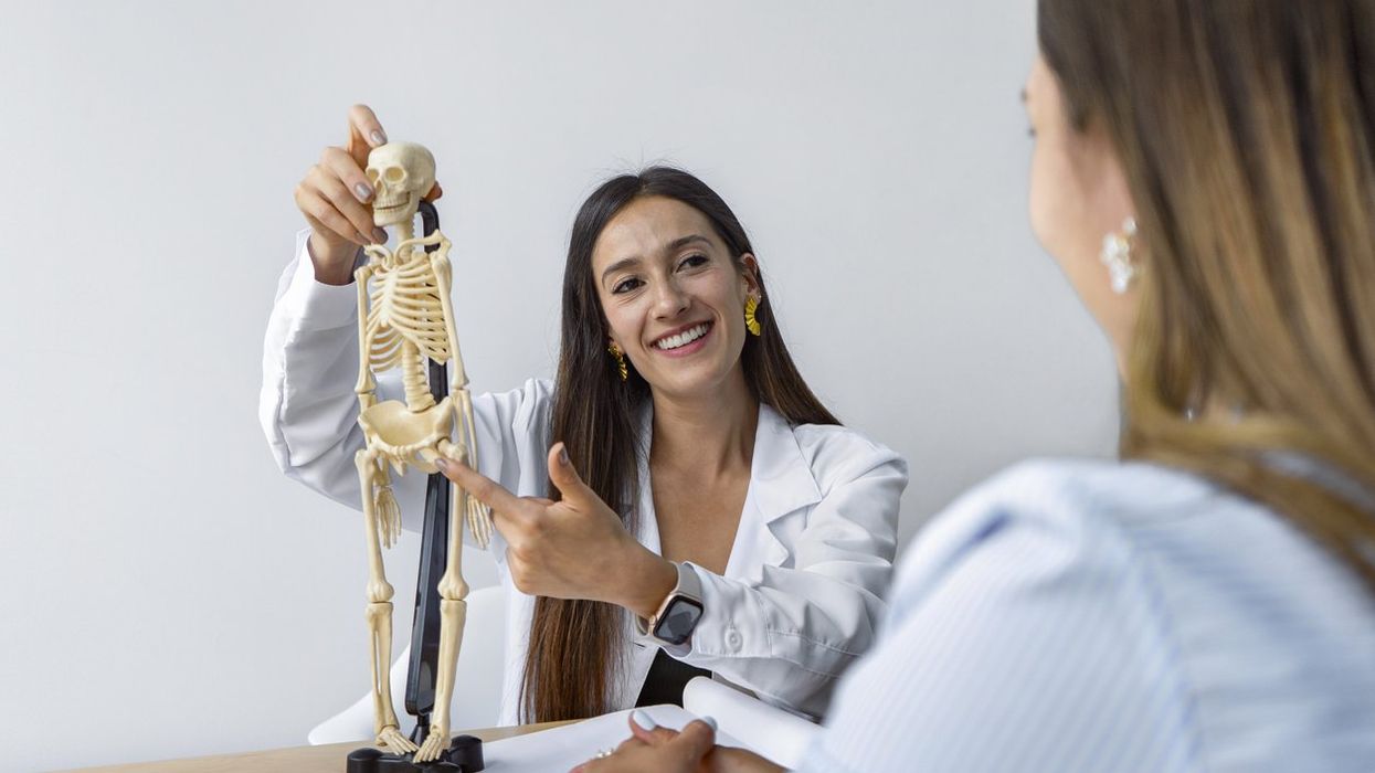 physician and patient in medical consultation at the clinic