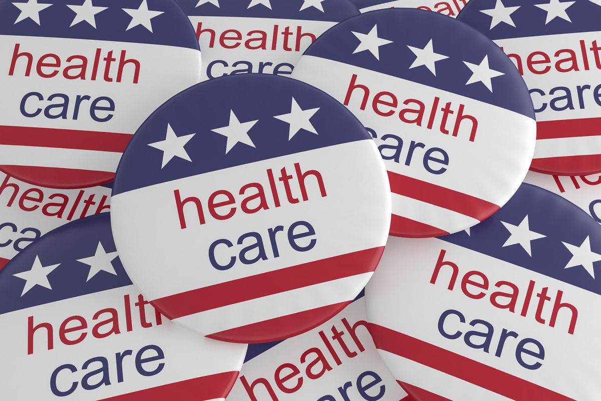 Pile of Health Care Buttons With US Flag