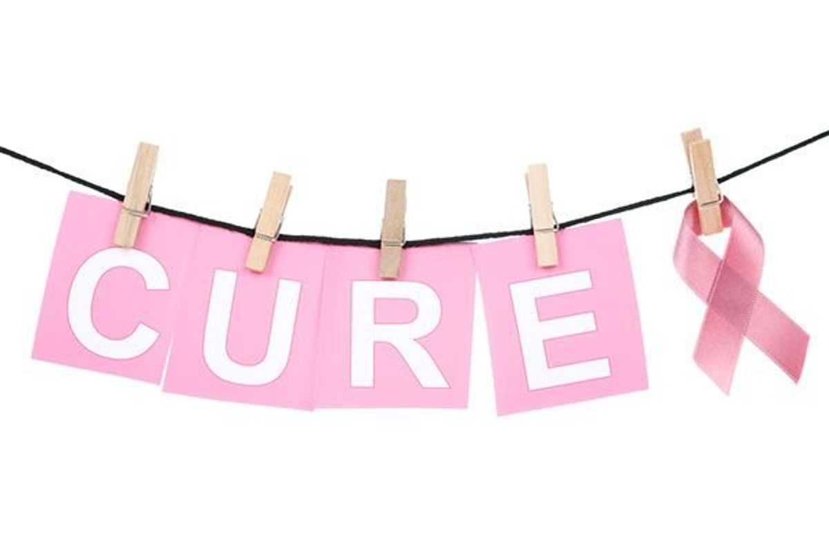 pink letters spelling the word cure