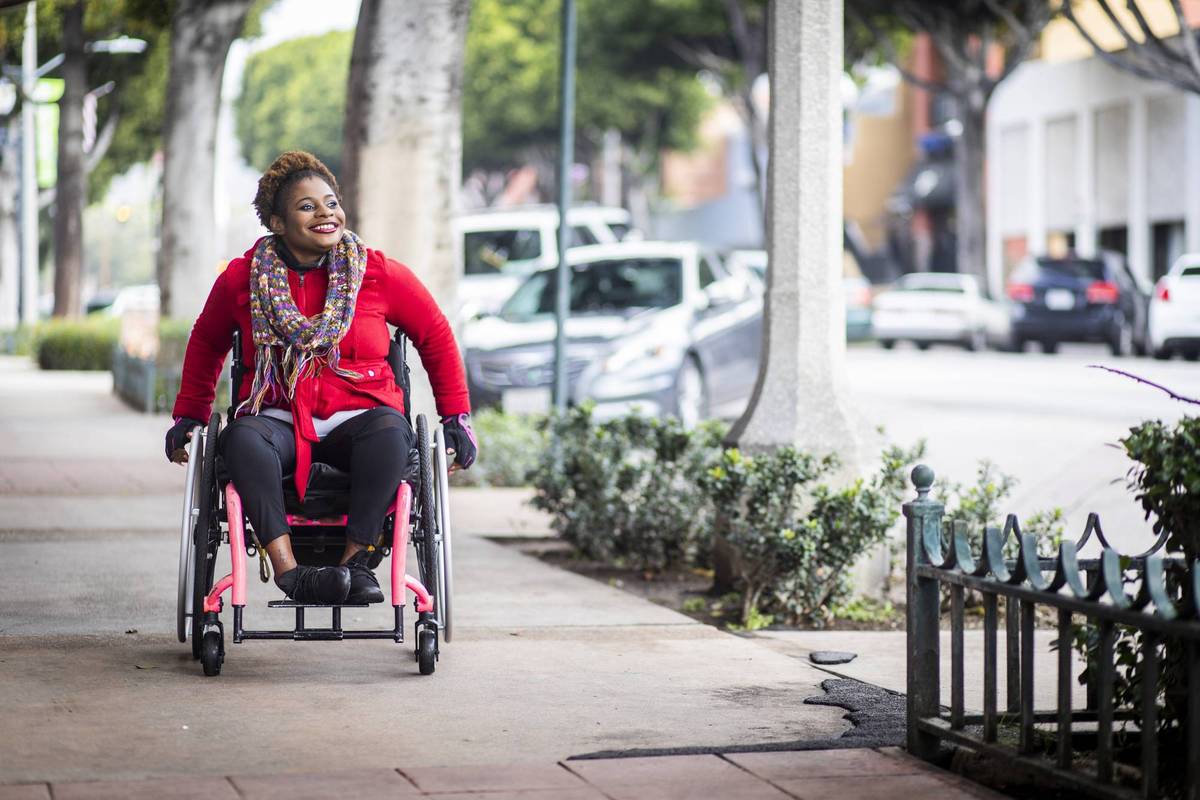 Portrait of a Young Black Woman in a Wheelchair