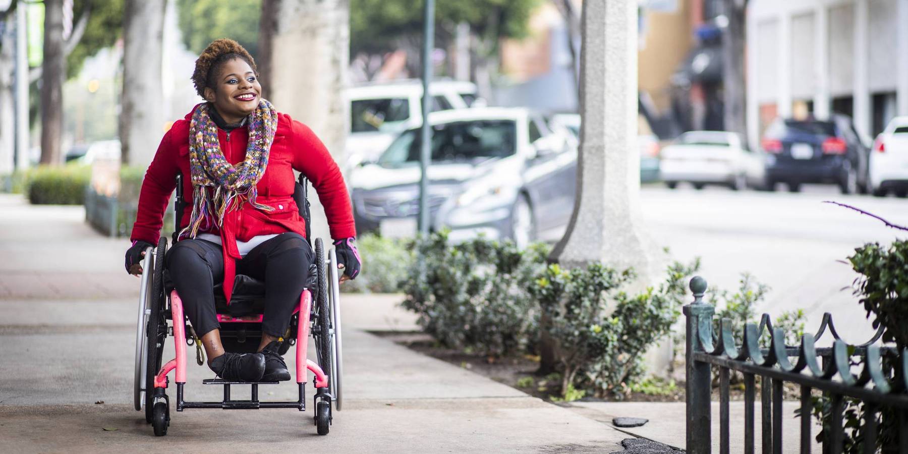 Portrait of a Young Black Woman in a Wheelchair