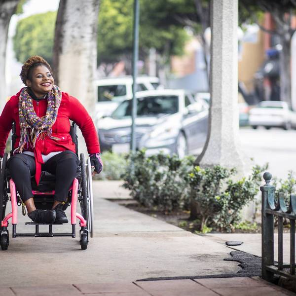 Portrait of a Young Black Woman in a Wheelchair