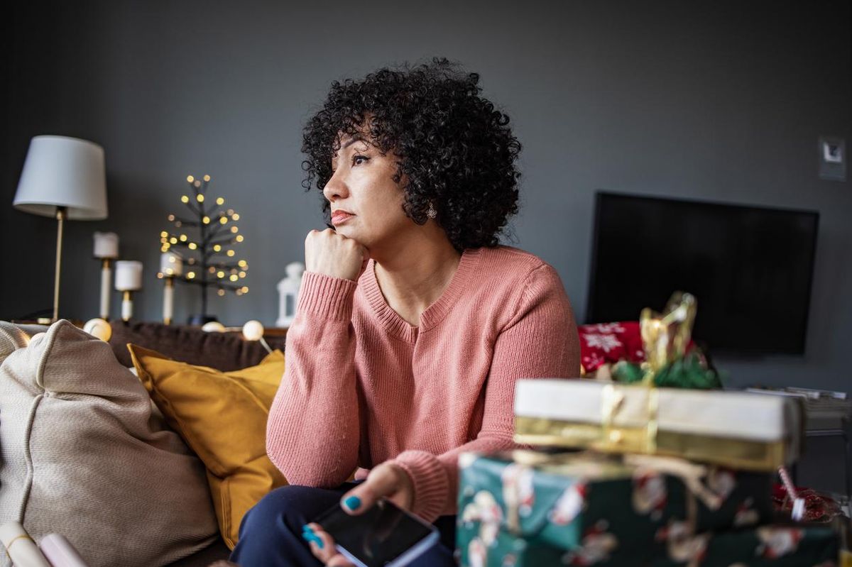 Portrait of mature woman at home during Christmas Holidays