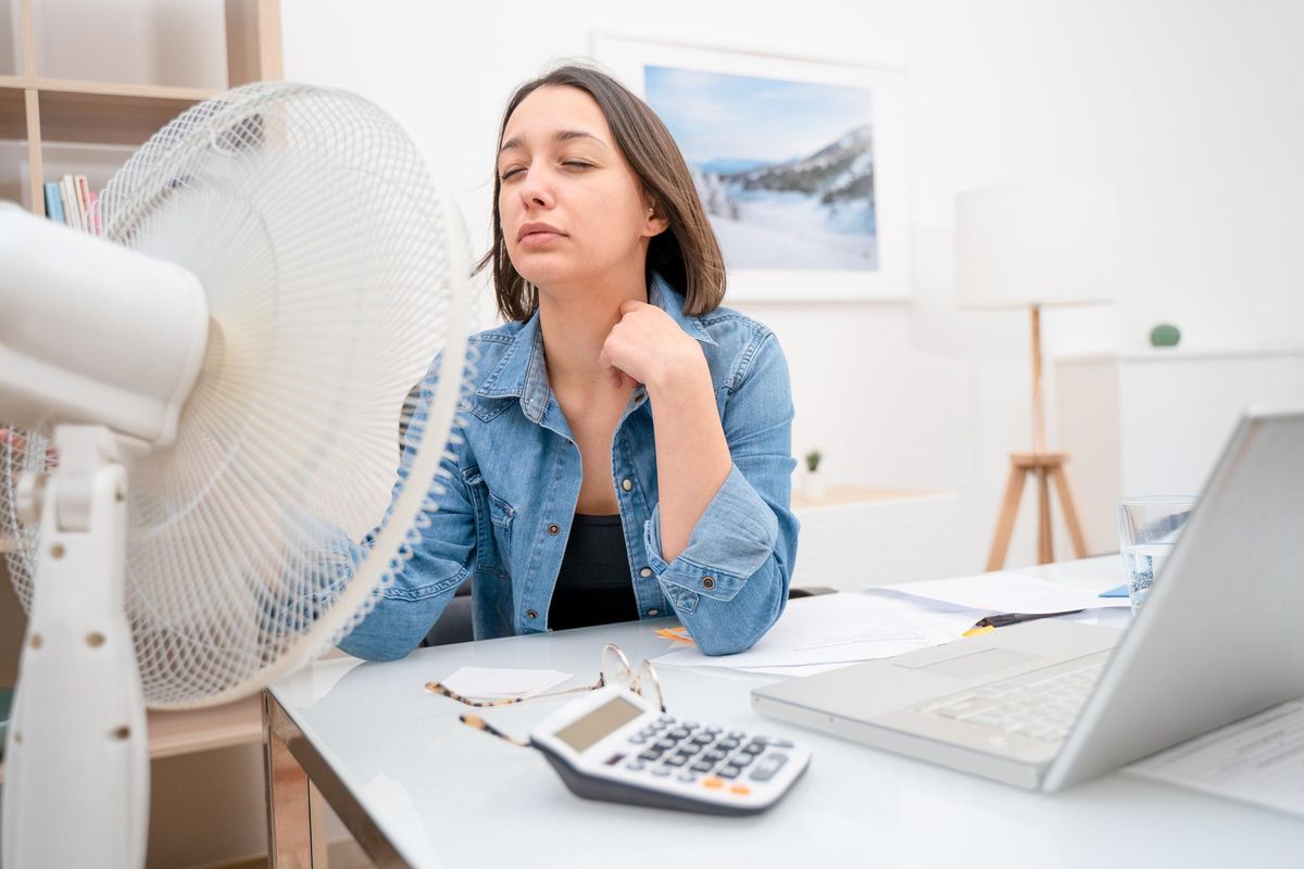 Portrait of one woman refreshing during summer heatwave