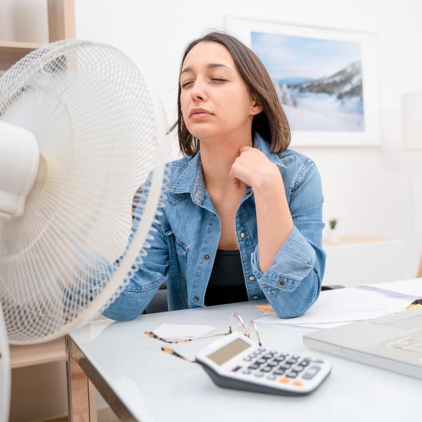 Portrait of one woman refreshing during summer heatwave