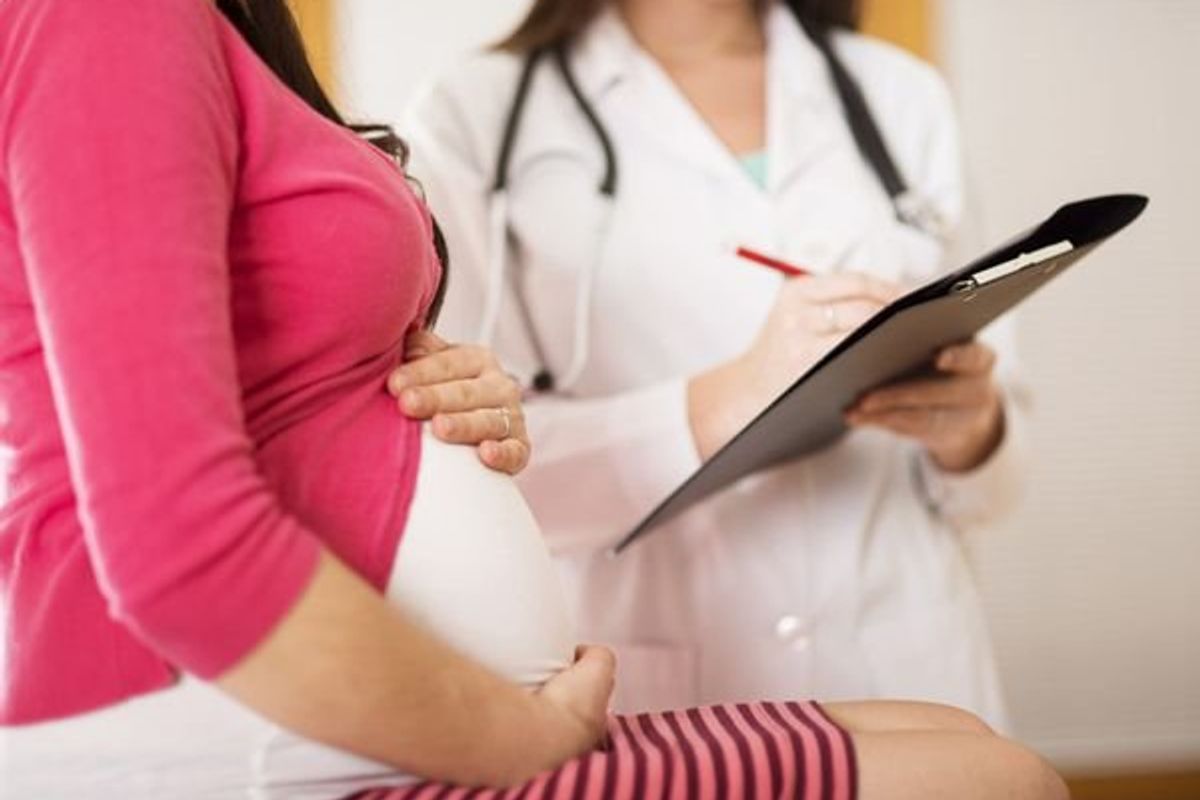 pregnant woman getting a checkup