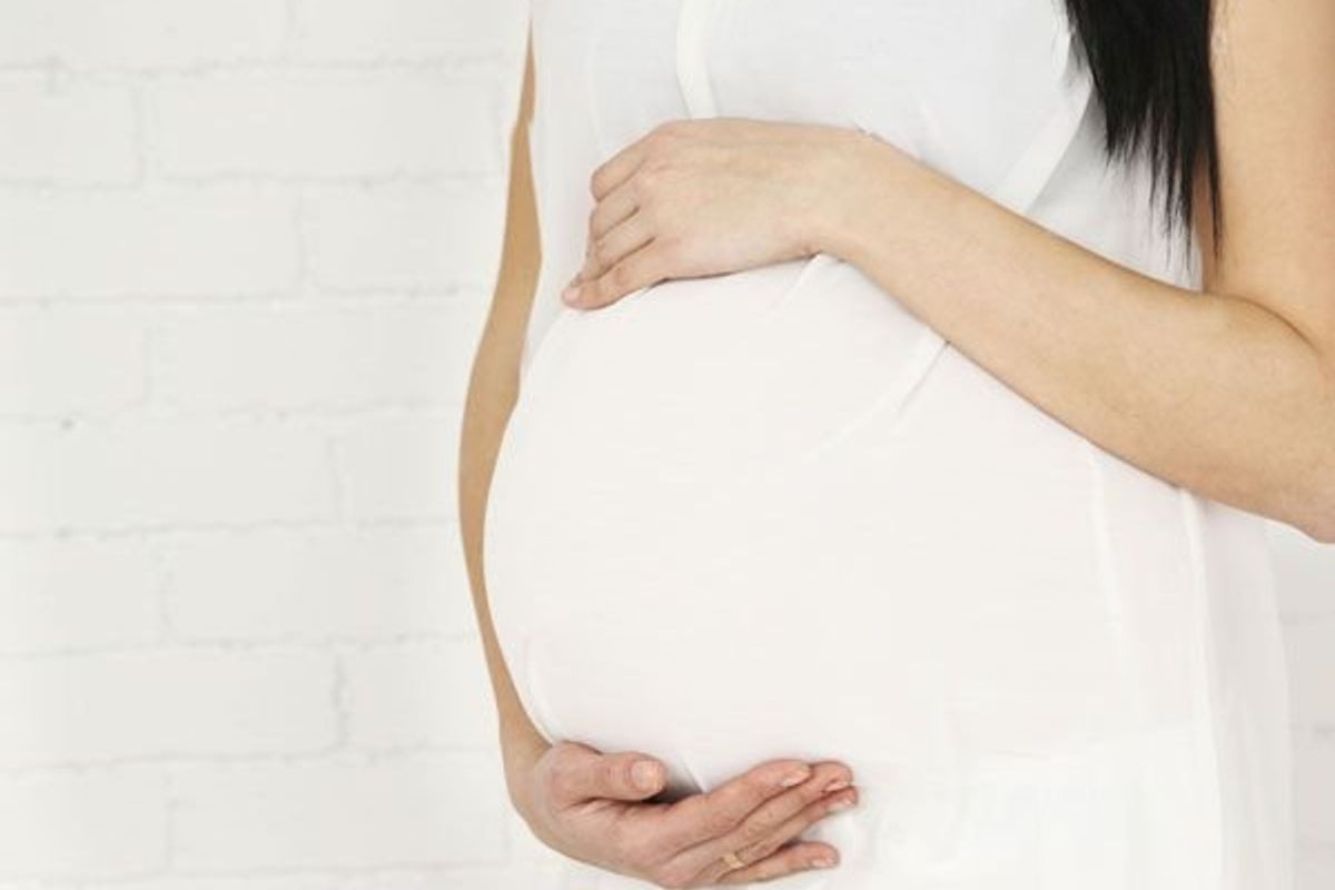 pregnant woman wearing white