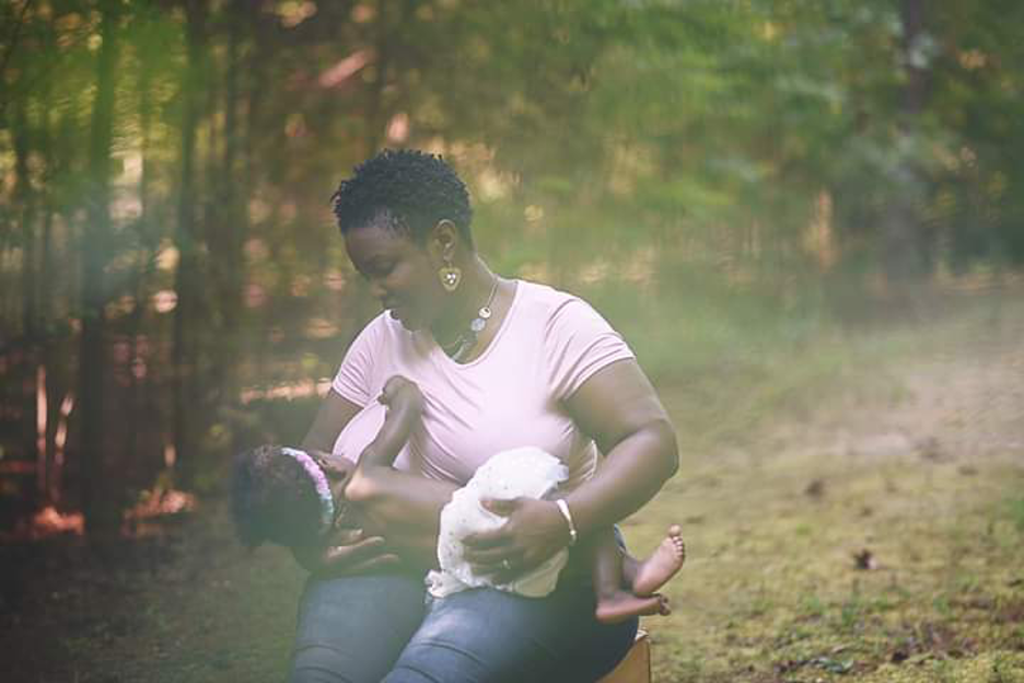 Purdy-Porter nursing her daughter.