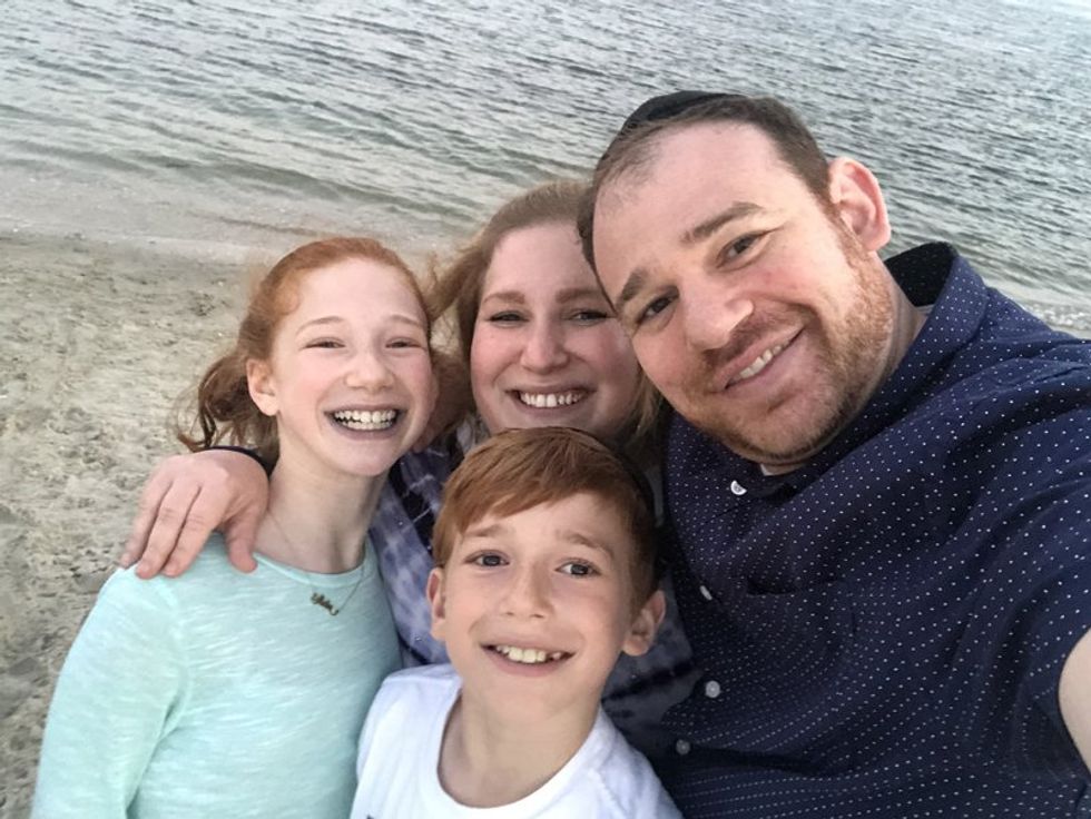 Rachel with her husband and children, 2019