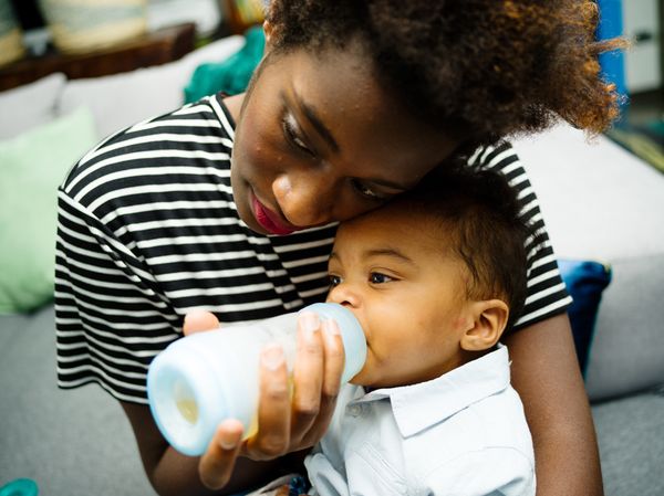 Real young mother with little son