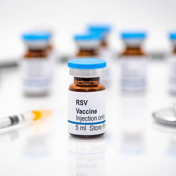 Respiratory syncytial virus RSV vaccine vial with syringe and stethoscope